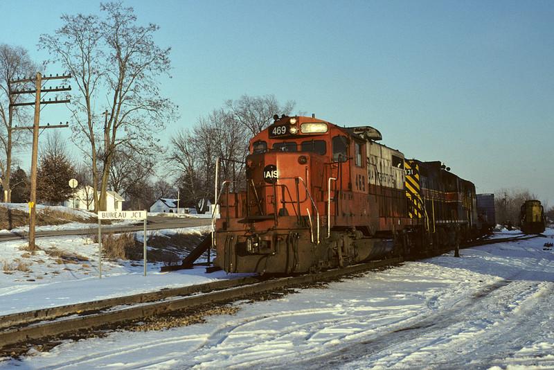 Another view of #469 on the #011 westbound at Bureau, Illinois - February 28th, 1993.