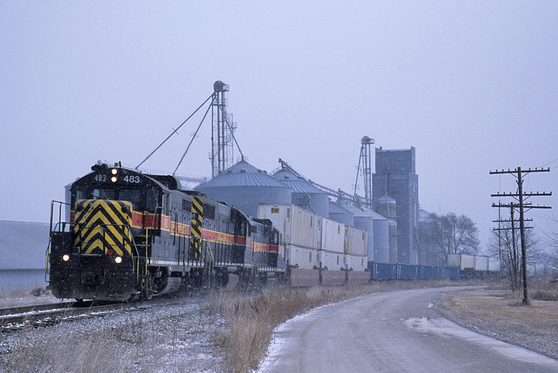 #483 and the West train at Marengo, Iowa 03/09/02.