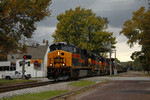 #510 with the East train comes down the hill and switches out the Junction at Taylor Street in Davenport, Iowa. IAIS' business car fleet is in tow for the QJ runs out of Rock Island from October 2008. 10/13/08