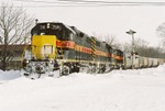 716 (minus it's IAIS emblem) pulls the BICB past the Rock Island depot in Iowa City on a snowy early January 2008 day.