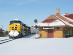 CBBI21 503 east passes the depot at West Lib. Feb. 22, 2010.