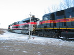 West train is passing the WB distant signal for the Gov't Bridge, at the west end of RI yard, Jan. 26, 2010.