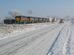 West train at the Wilton Pocket, Dec. 17, 2007.  The guy driving the maintainer used to be the local track inspector, so he knows the drill....