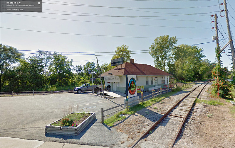 Milan depot with Eagle Sub in the foreground. Eagle Sub services Roberts & Dybdahl lumber company.