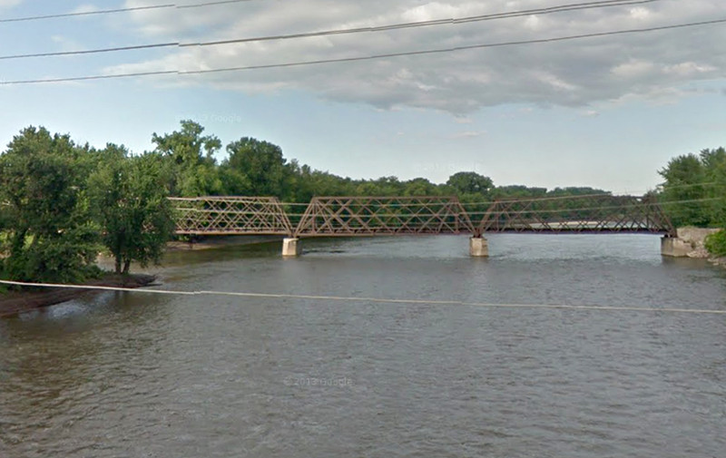 Rock River crossing with lattice truss bridges.