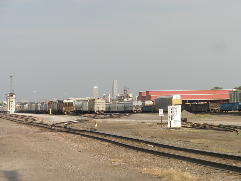 Prototype photo of UP's Pool Yard looking west on August 11, 2013, with Omaha's skyline in the distance. I'm only modeling the 8 tracks on the left on the visible portion of the layout.  Those further to the right, once known as UP's North Yard, are across the aisle on the layout, reached via a gate, and used as the west end of staging.