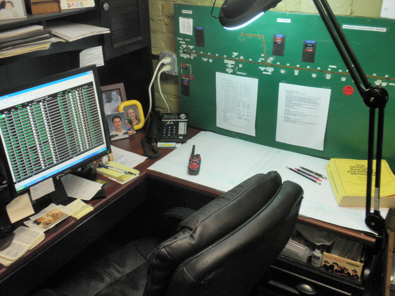 New IAIS dispatcher/clerk desk for my layout.  On the right is a retired prototype IAIS West End train board (from the original Iowa City headquarters building), IAIS train sheets, pens and pencils, and an era-appropriate ORER.  The new Car Management System I developed is up on the computer screen, based on IAIS screen layouts.  Wireless fast clocks are provided courtesy of Iowa Scaled Engineering, http://iascaled.com .