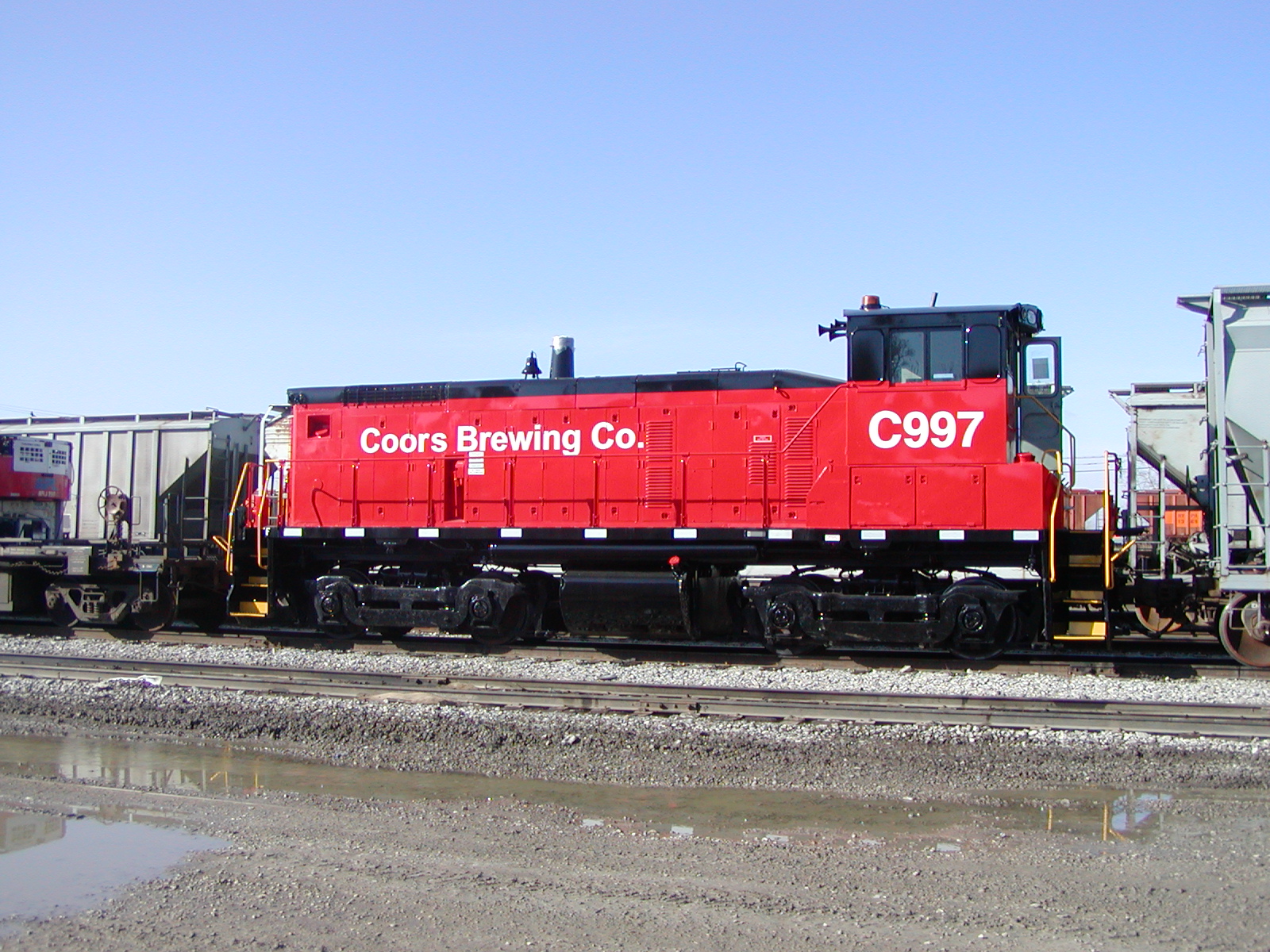 Coors (CORX) 997, a new switcher headed for the brewery at Golden, CO, on 5-Apr-2003