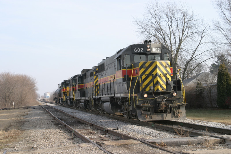 IAIS 602, seen looking east at the Henry St. crossing on 29-Dec-2004.  The stub on the left is the old siding and CenPeCo's unloading site.