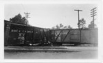 A derailment at the Main St. crossing, date unknown (probably around 1927)