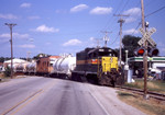 IAIS 403 crosses Andulusia Rd on the Milan Branch in Milan, IL on June 22, 2005.