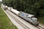 The Weed Sprayer heads west under the IL-5 overpass at Silvis, IL on 25-Jun-2007.