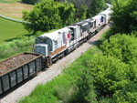 Dead GEs, scrap, and ARMN reefers, getting made up for the eastbound out of Bluffs, June 20, 2006.