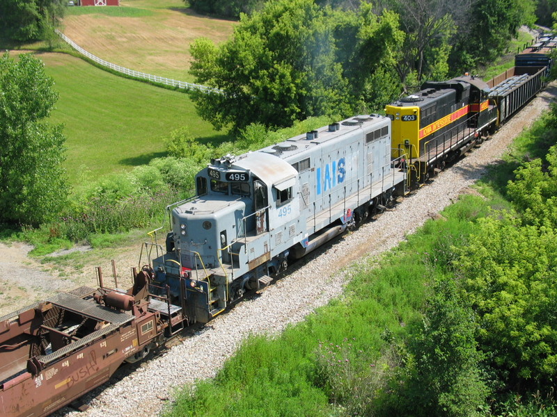 Bluffs switcher power (with the inbound west train on the point) at Council Bluffs, making up the east train.  June 20, 2006.