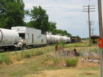 Weed sprayer train is heading for Des Moines, on the head end of the eastbound.  June 20, 2006.