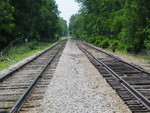 Looking west at the former west switch of the old Hillis siding, now just a stub ended setout track, just east of Hancock.  In the distance is the eastbound, June 20, 2006.