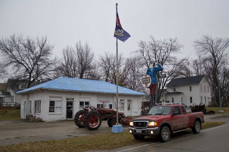 Neat sign for the old service station at Menlo, IA.