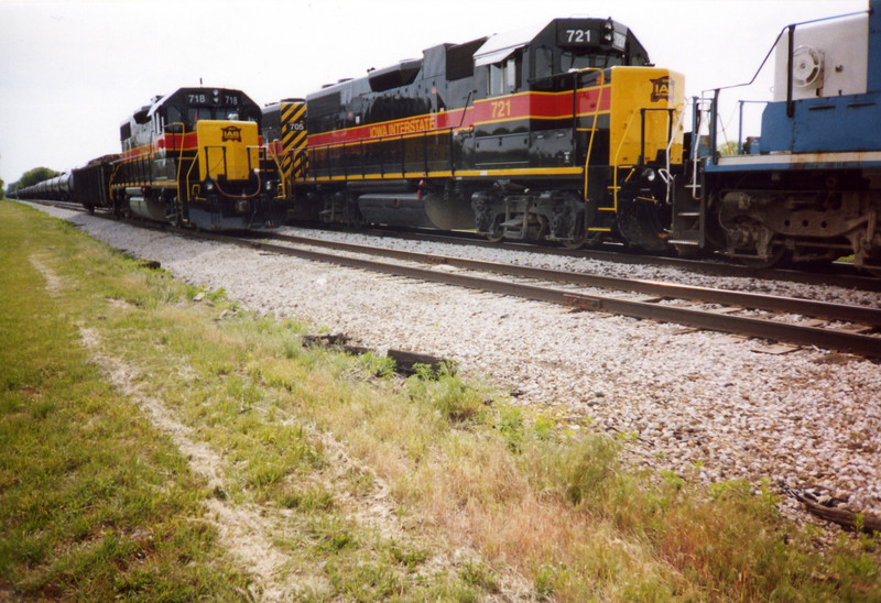 The westbound RI turn has just set out an engine and car for the Wilton local crew to use later on.  N. Star siding, May 2005.