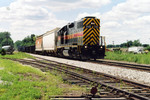 The local heads east past the Wilton house track and switch to Precision Steel, mp 208.  July 27, 2005.