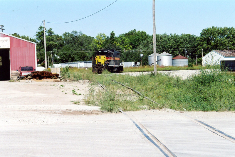 403 heading down the spur towards Wilton Precision Steel.  1st st. is in the immediate foreground. Sept. 14, 2005.