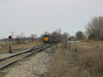 Picking up 2 empty HSs from the east end of W.L. siding, March 23, 2006.