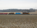 RI turn (with the Wilton Local crew) picks up loaded HSs from the west end of West Lib. siding.  March 23, 2006.