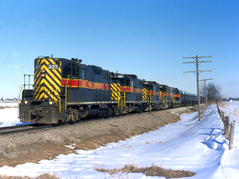 325 marches west with a Rock Island turn at Walcott, Iowa  March 13, 1999