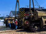 325 gets a helping hand from the Hulcher boys after going on the ground at Rock Island, Illinois  June 4, 2004