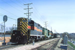 325 Heads up an RIIC train approaching the Government Bridge at Rock Island, April 10, 2004.