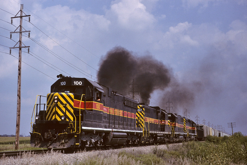 100 belches up the smoke on a "BICB" train at Davenport, Iowa August 13th, 1998