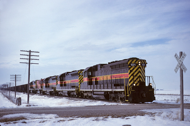 101 runs long hood forward with an eastbound "CRPE" empty coal train at Walcott, Iowa January 20, 1999