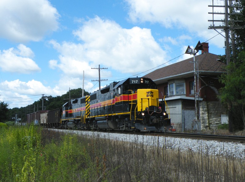 Continuing eastward, the short local passes through LaSalle, IL and another depot, this one being fully restored including the triangle train orders signal.
