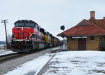 Doing every bit of track speed, Iowa 513 cruises through West Liberty and passed the restored depot and photo line. It was nice seeing all the usual familiar faces out and about. My favorite part of the chase was next as we speed out of town following Andy's vintage station wagon. Haha, it was nice to see such a older car get up and go!