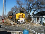 Nearing Limit Yd Yard Limits, the BUSW is down to a crawl as they maneuver the tight quarters in Peoria Heights.