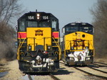 154 and 510 are ready to tack onto the head end of the loaded PECR coal train that is currentlyholding themain behind me. Iowa 512 has been set out on yard track 2 in order to be tacked on the rear of the coal train in DPU mode once it is pulled passed the south switch of Limit Yd.