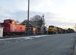 Iowa 512 has the coal train in control as they head back north passed the restored depot and caboose in Chillicothe.