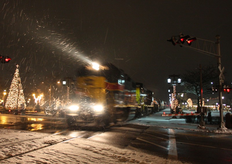 Iowa 719 and 507 double team the west train through Tinley Park, still decked out for the holidays.