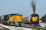 The 601-650 Cow-Calf works Rock Island Yard as a new UP GenSet Locomotive fresh out of NRE Silvis looks on. August 12th, 2007.