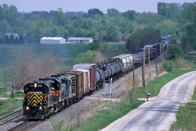 #602 leads a detouring CBBI train on the BNSF Barstow Subdivision. Photo is at Briar Bluff, Illinois 05/10/03.