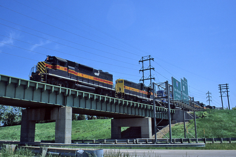 Westbound #603 with a BICB train crosses I-280 at Probstei, Iowa May 19th, 2004.