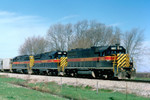 627 runs an eastbound through the siding at Walcott, Iowa April 14, 1998