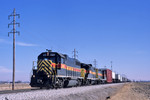 A "BICB" train blasts out of Davenport, Iowa with 628 leading the way on February 21, 2003.