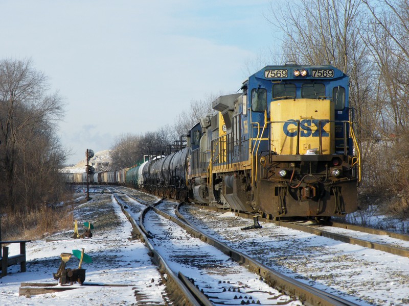 CSXT's eastbound J746 waits for clearance eastbound after the morning Metra rush at Rockdale.