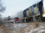 ANBIU holds the main while CSX's J743 Rockdale Yd job takes headroom wbd.