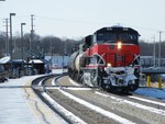 With blocks behind the previous eastbound metra, Iowa 513 thunders through New Lenox with 80 tanks of fuel.