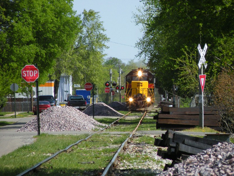 Creeping through Chillicothe, the Iowa definately has some track plans in the works for Sub 2, as can be seen by new ties and C&NW esque pink ballast dumped all along the right of way through town.