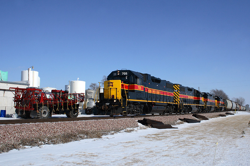 705 marches west through Walcott, Iowa with the west train, February 1st, 2007.