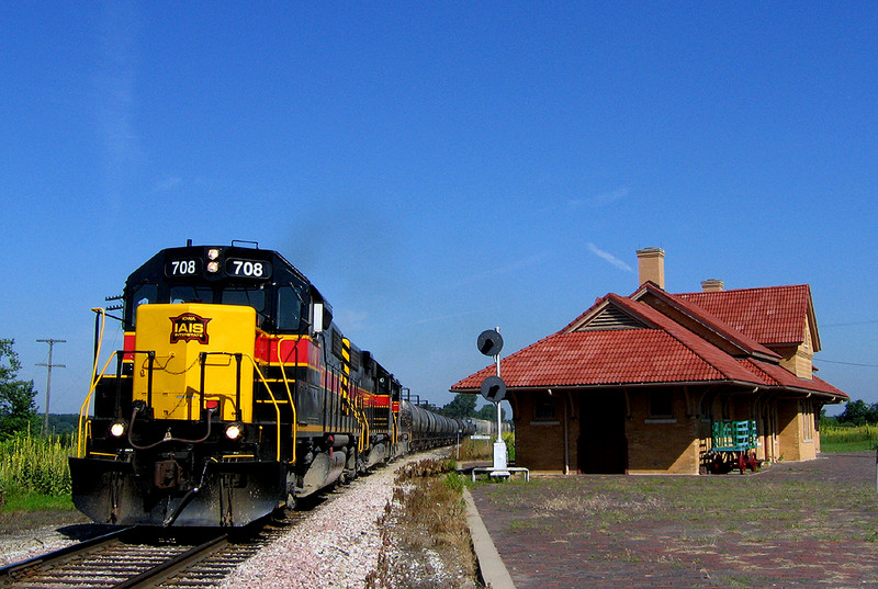 CBBI passes the ex-RI depot at West Liberty, Iowa.  July 9th, 2006