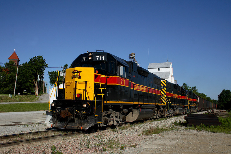 You can't get a 7-Eleven Slurpee in Iowa anymore, but you can get IAIS 711 East at Oxford with a cut of empty coal hoppers. June 9th, 2007.