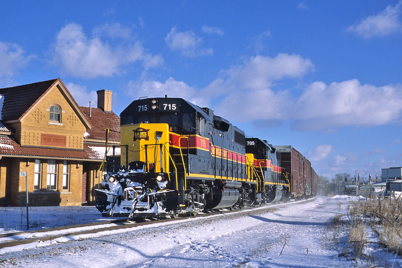 BICB kicks up the snow passing the West Liberty Depot with 715 on the point. January 22nd, 2005.